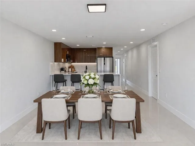 Dining room featuring recessed lighting and baseboards