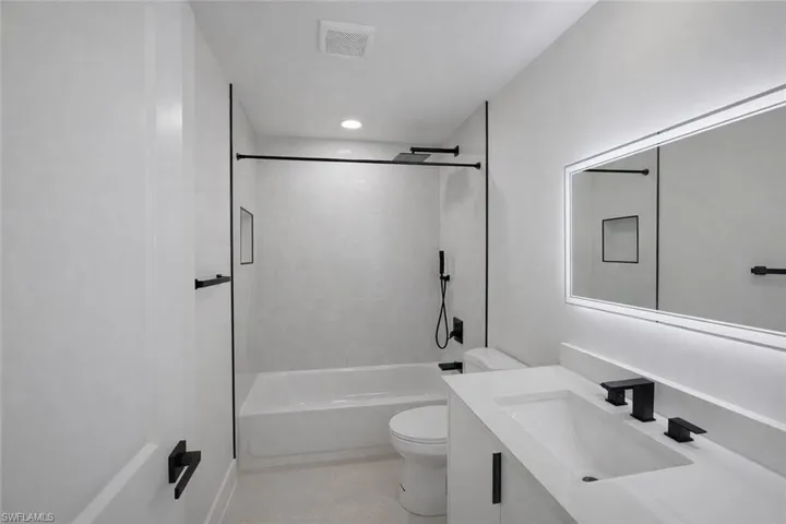 4531_Full bathroom with vanity, tub / shower combination, and recessed lighting