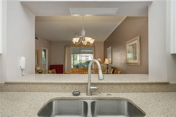 Kitchen area looking out at the family and dining areas