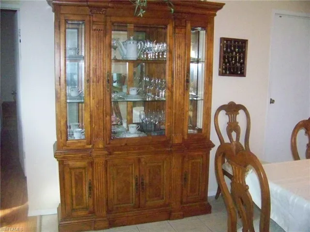 Hutch/China cabinet in dining room.