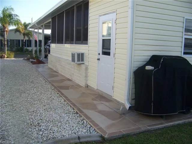 Matching walkway to driveway. Nicely stamped. Door to rear shed #1