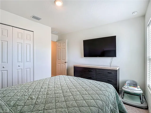 Bedroom featuring a closet