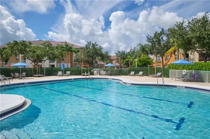 View of swimming pool with a patio area