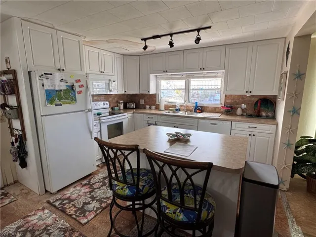 Lots of storage and features an eat-at island