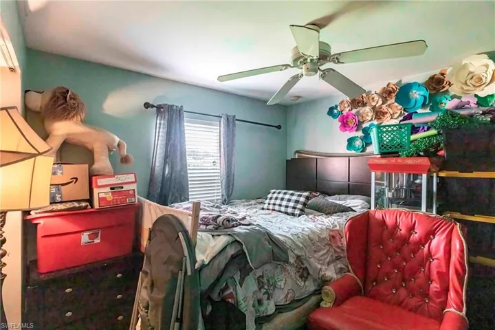 Bedroom featuring a ceiling fan
