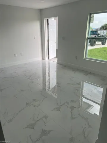Empty room with tile flooring