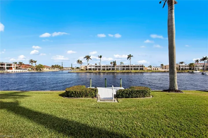 Property view of water featuring a dock
