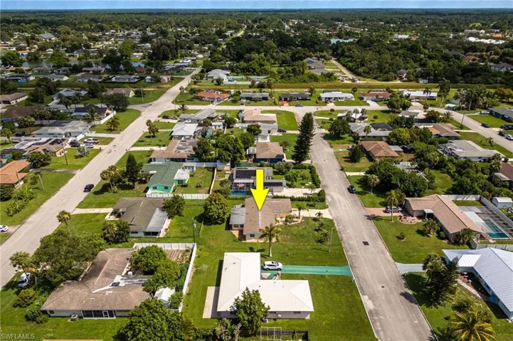 View of property location with nearby suburban area