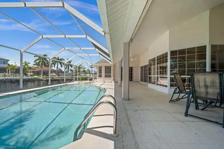 Large Pool and Lanai with roll down Hurricane Shutters