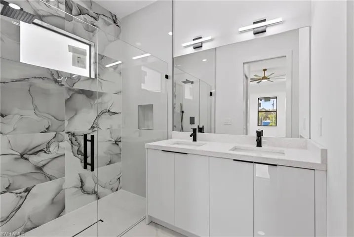 Dual vanity with integrated sinks and quartz countertop