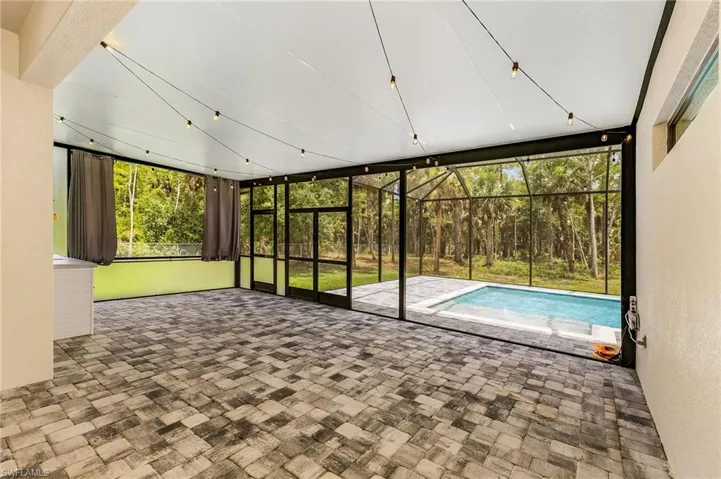 Unfurnished sunroom with a healthy amount of sunlight