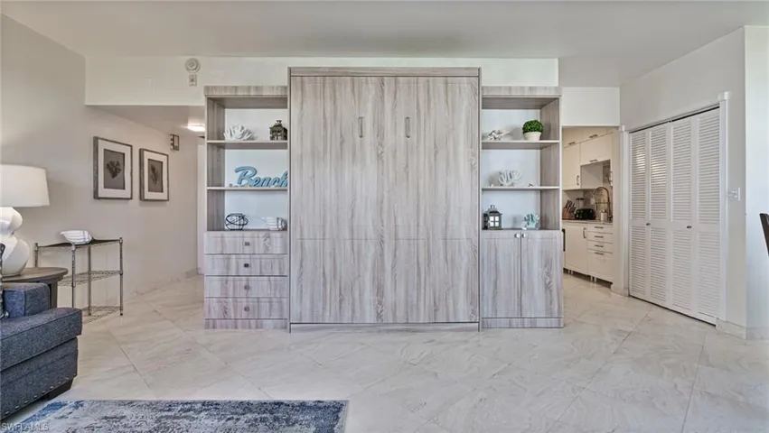 Living room featuring light tile patterned floors