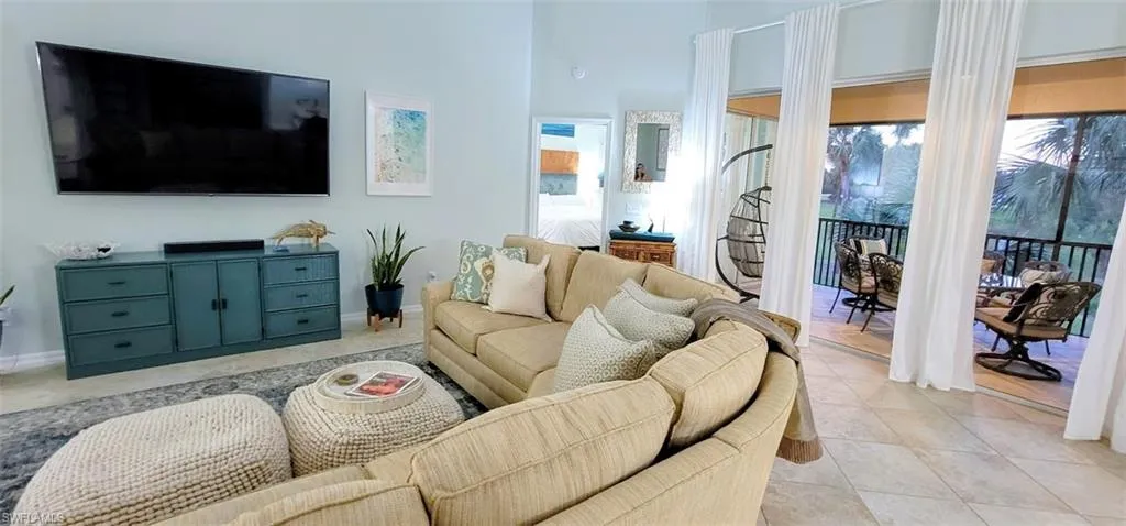 Large living room sectional with big screen TV