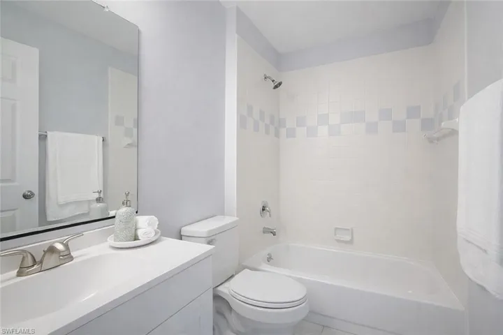 Full bathroom featuring vanity and shower / bath combination