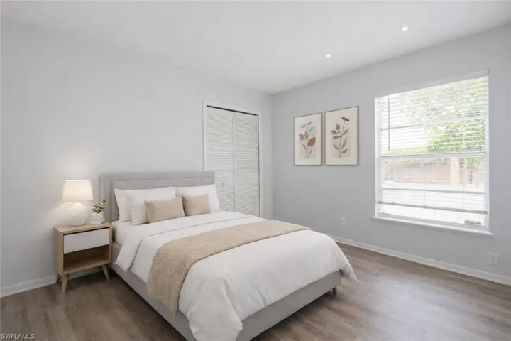 Bedroom featuring baseboards and light wood-style floors