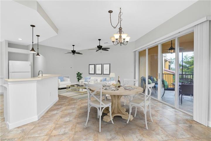 This home has plenty of space to entertain guests... from the kitchen island to the dining table, family room, and oversize lanai! (photo digitally staged)