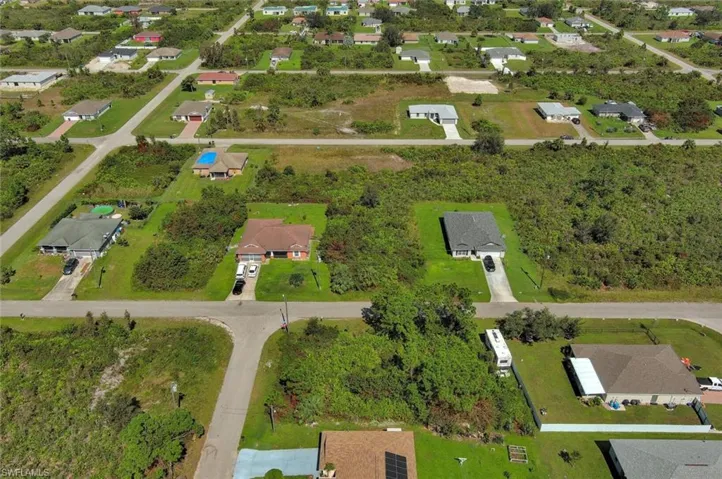 View of property location featuring nearby suburban area