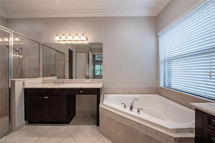 Double vanities with separate shower and soaking tub