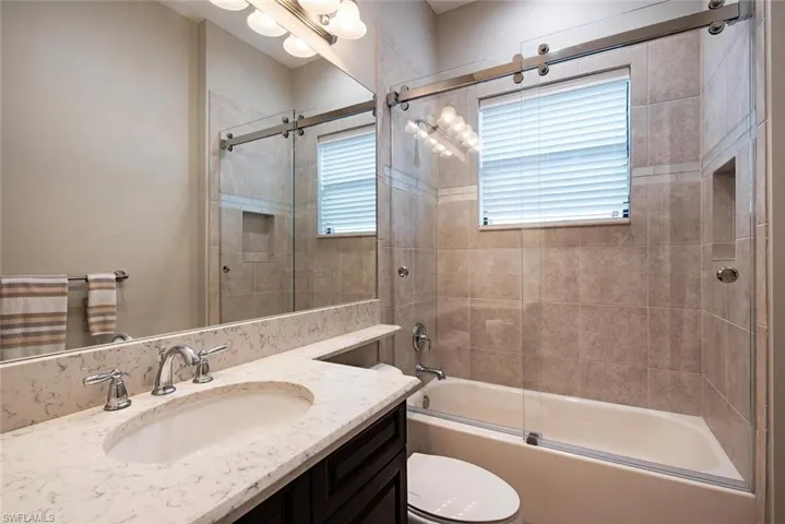 Guest bathroom with glass enclosure