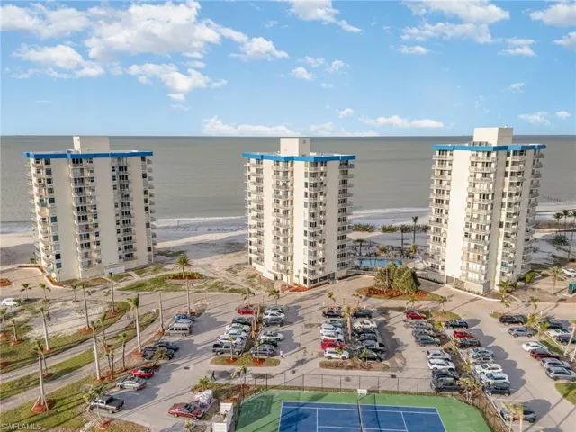 Drone / aerial view of waterfront with a beach