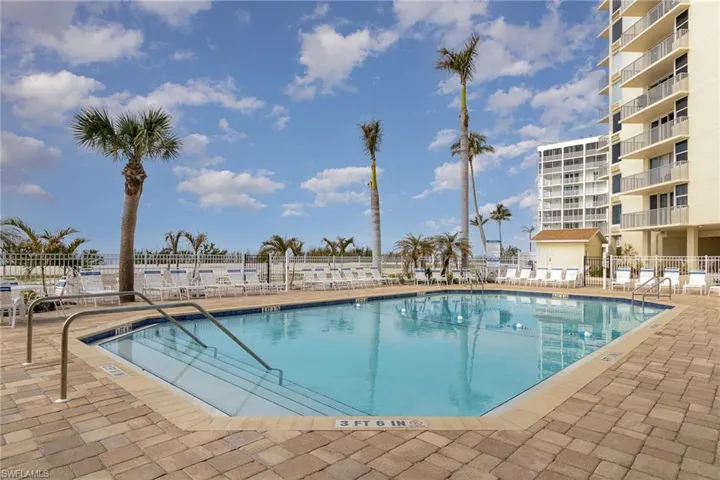 Community pool featuring a patio area