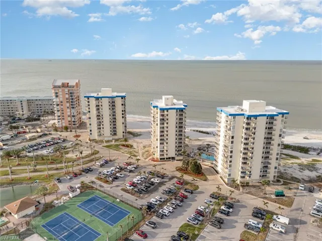 Bird's eye view of apartment complex / building and a large body of water