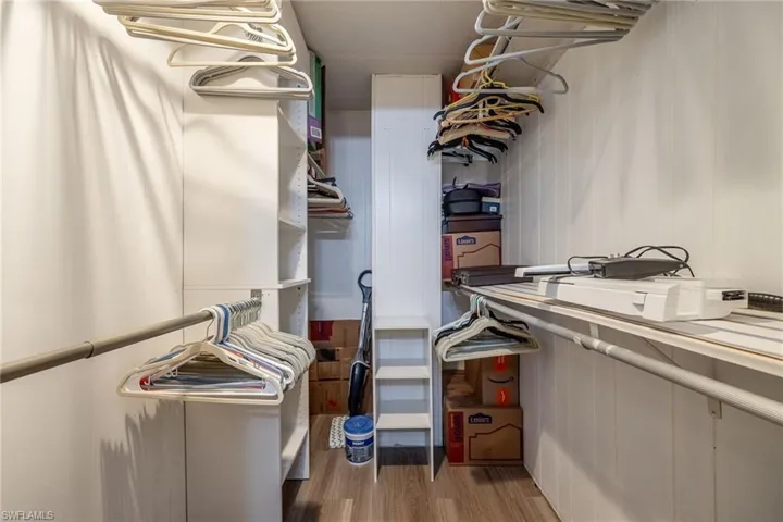 Spacious closet featuring wood finished floors