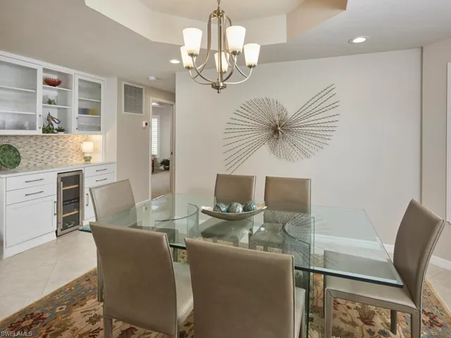 Dry bar with beverage refrigerator.