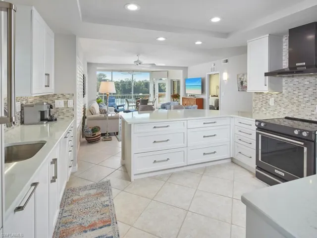 Beautifully updated kitchen with tons of storage drawers, new appliances and quartz countertops.