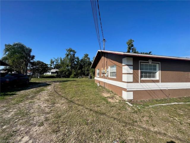 1104-1106 Harry AVE S, LEHIGH ACRES FL 33973