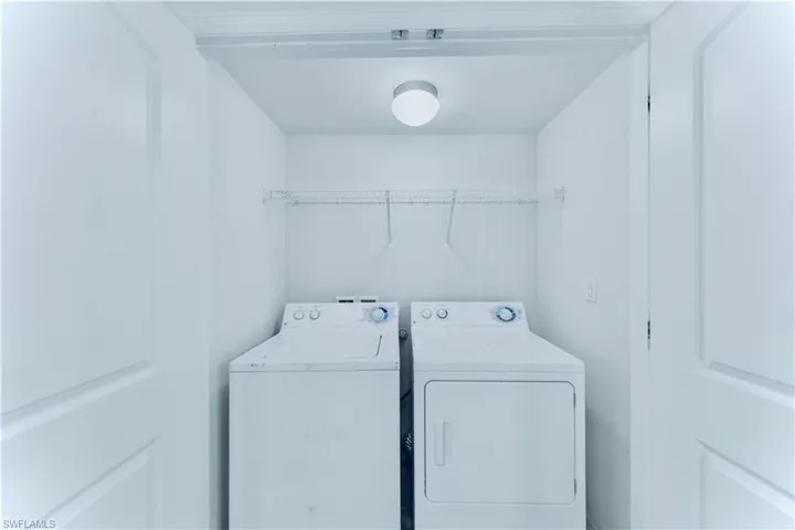 Laundry area featuring washing machine and dryer