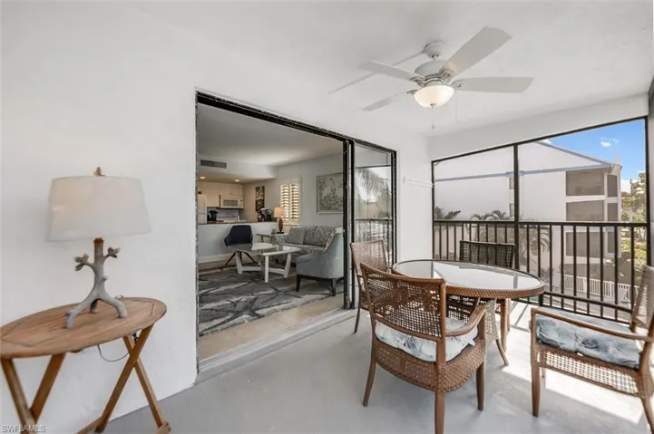Sunroom / solarium with ceiling fan and plenty of natural light