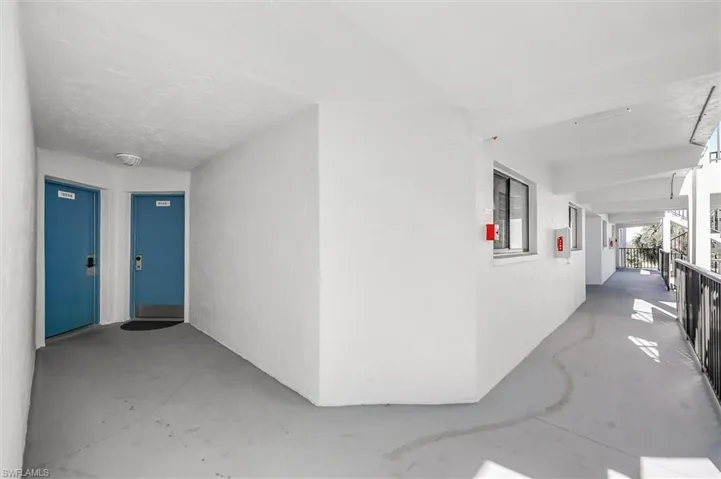View of exterior entry featuring stucco siding