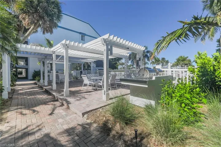 View of patio / terrace with a pergola and outdoor dining space
