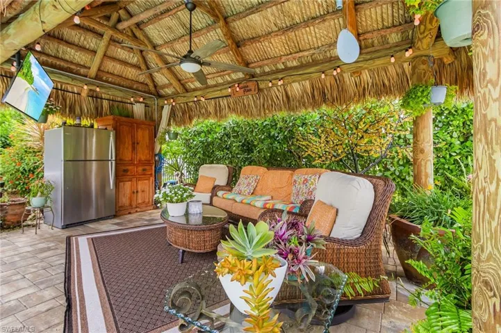 View of patio / terrace with a gazebo, a ceiling fan, and outdoor lounge area