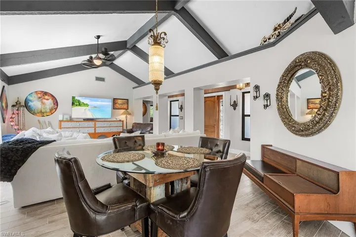 Dining area with light wood finished floors