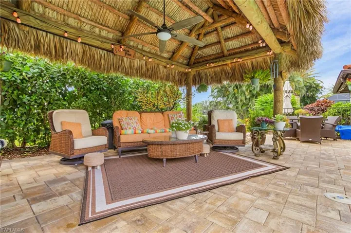 View of patio / terrace with a gazebo, a ceiling fan, outdoor lounge area, and outdoor dining space