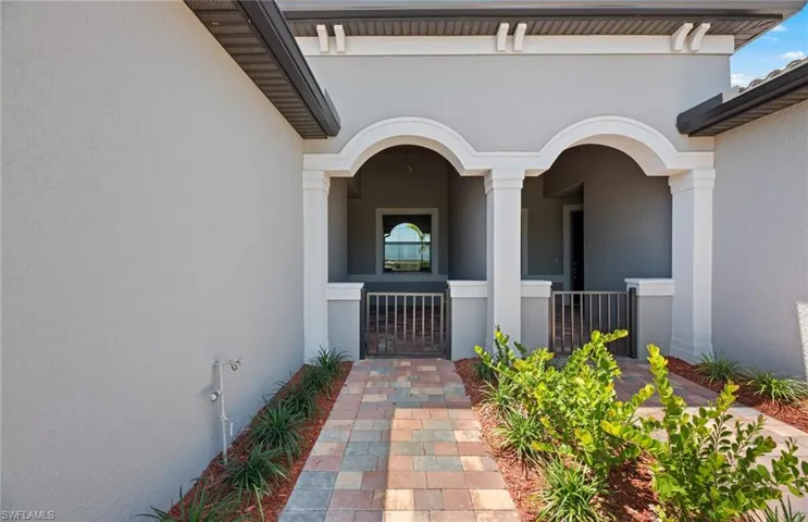 Welcoming entry with gated area