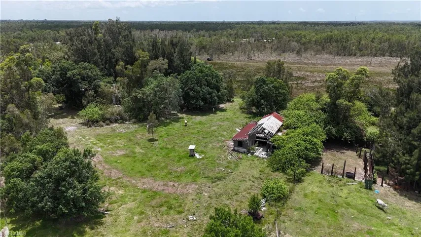 Drone / aerial view of a heavily wooded area