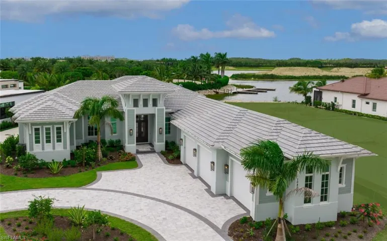 Mediterranean / spanish-style home with a water view