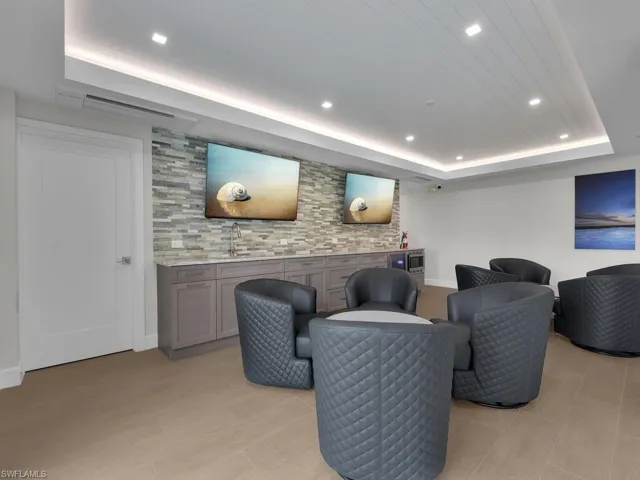 Common area with recessed lighting and a sink