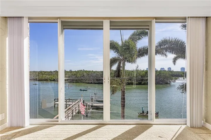 Amazing, expansive views of the bay from the living room and main bedroom.  This shot is from that main, east facing bedroom where You will experience Magnificent sunrises and moonrises!