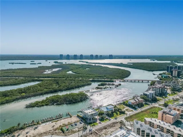 Enjoy the Paradise lifestyle of beaching and boating from this Bayfront beauty.