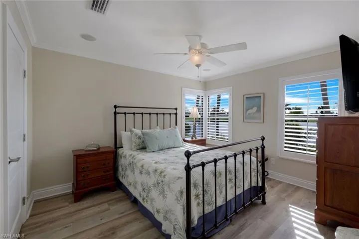 Guest Bedroom III- Also has a Walk In Closet- Shown with a Queen Bed
