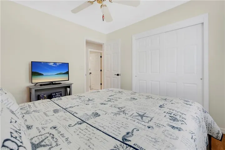 Bedroom #2 with ceiling fan and a closet