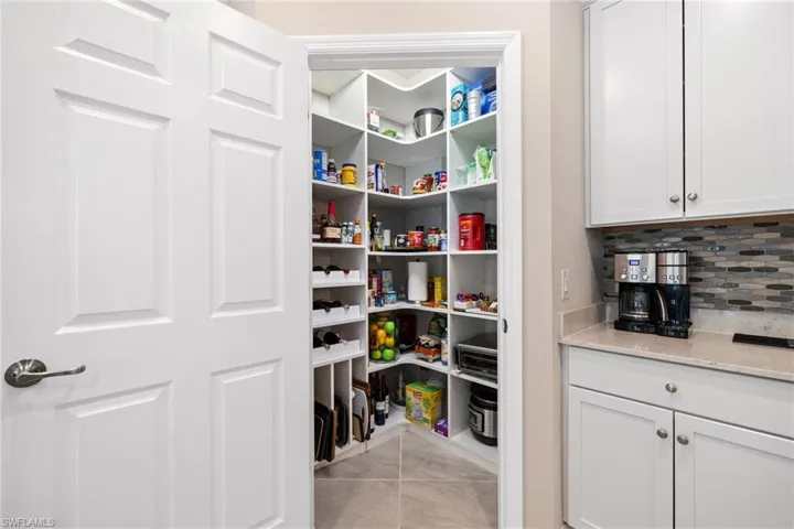 Built in pantry with wine storage