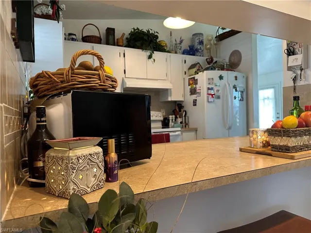 View of the Breakfast Bar looking into the Kitchen