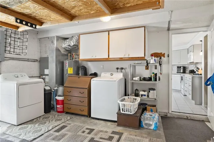 Washroom featuring washer and dryer