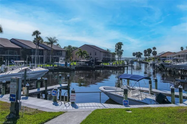 Dock with a water view and boat lift