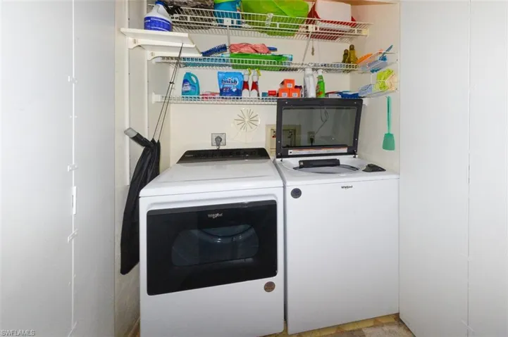 Laundry area featuring washer and clothes dryer